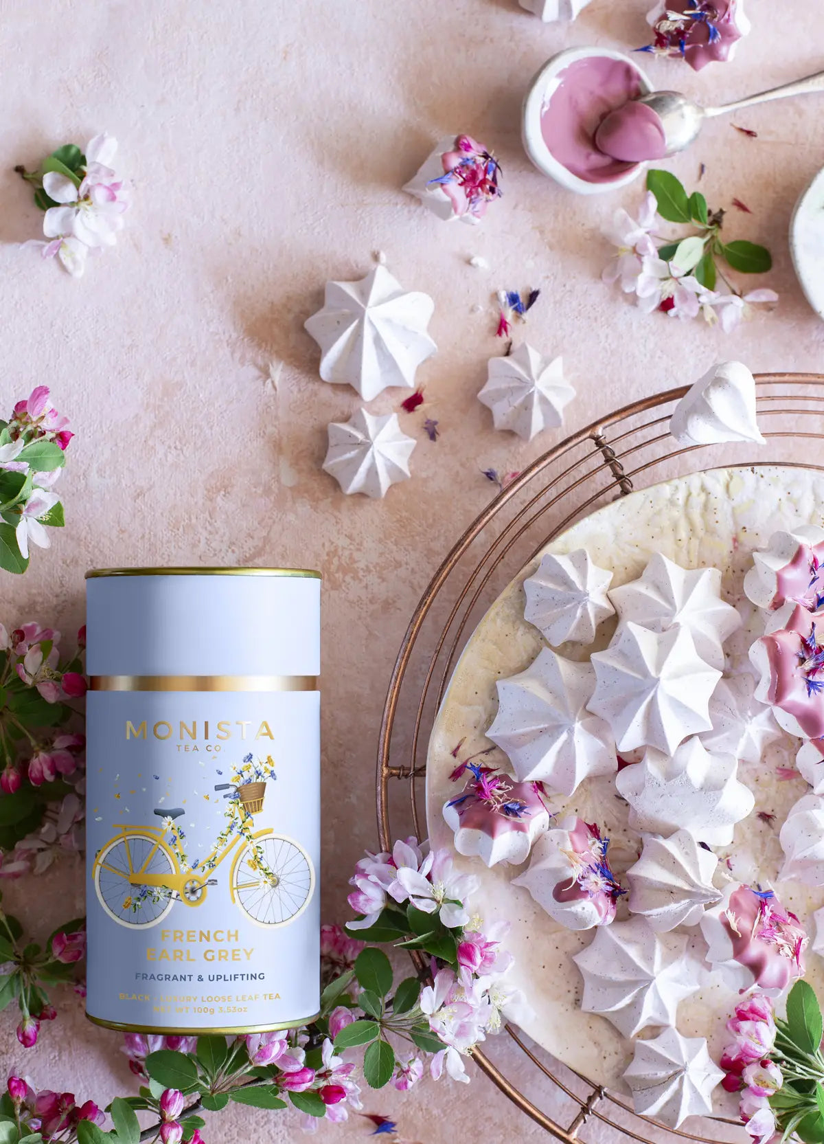 French Earl Grey Meringue Kisses with pink flowers and blue tea canister