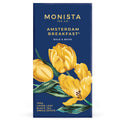 Navy blue Amsterdam Breakfast tea refill box with a yellow tulip illustration