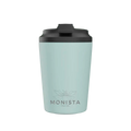 Pink insulated cup with a black lid and 'Monista Tea Co.' flower logo on a white background
