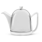White ceramic teapot with a stainless steel dome cosy on a white background