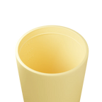 Yellow cup on a white background