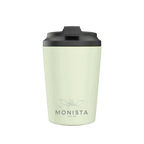 Pale green insulated cup with a black lid and 'Monista' branding on a white background