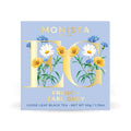 Monista Tea Co. French Earl Grey tea packaging with floral design on a light blue background