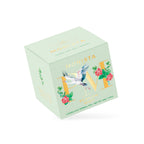 Sage green Persian Mint tea box with a gold crane monogram design shown at an angle