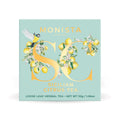 Mint green Sicilian Citrus tea box with a gold bird monogram design on a white background