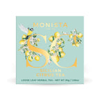 Mint green Sicilian Citrus tea box with a gold bird monogram design on a white background