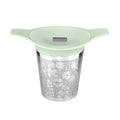 Mint green lidded tea basket infuser with stainless mesh on a white background