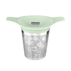 Mint green lidded tea basket infuser with stainless mesh on a white background