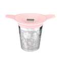 Tea infuser with floral design and pink lid on a white background
