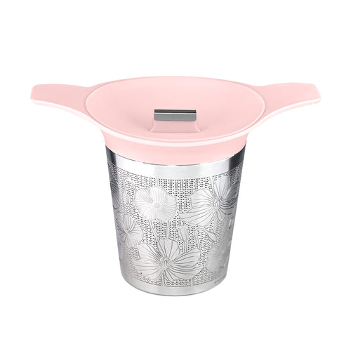 Tea infuser with floral design and pink lid on a white background