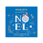 A square blue Monista Tea Co. gift set box labeled 'NOEL' with festive illustrated ornaments, flowers, and stars, and text reading 'Spiced Christmas Tea' and 'Tea for one gift set.