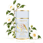 Tea canister with floral design and Monista branding on a white background