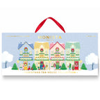 Monista Tea Co Christmas Tea House Collection gift box with a red hanging ribbon, featuring an illustrated winter village scene on a light blue background.