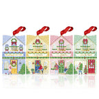 Four Christmas boutique-shaped ornaments in pastel blue, yellow, pink, and green, each with a red ribbon hanger and festive illustrated storefronts, displayed on a white reflective background.