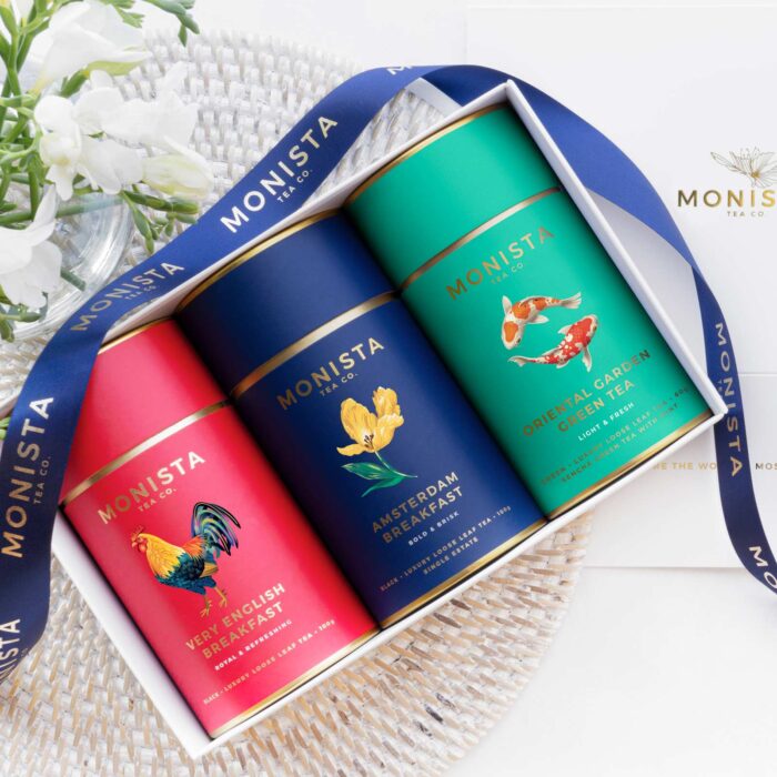 three tea canisters in a gift box