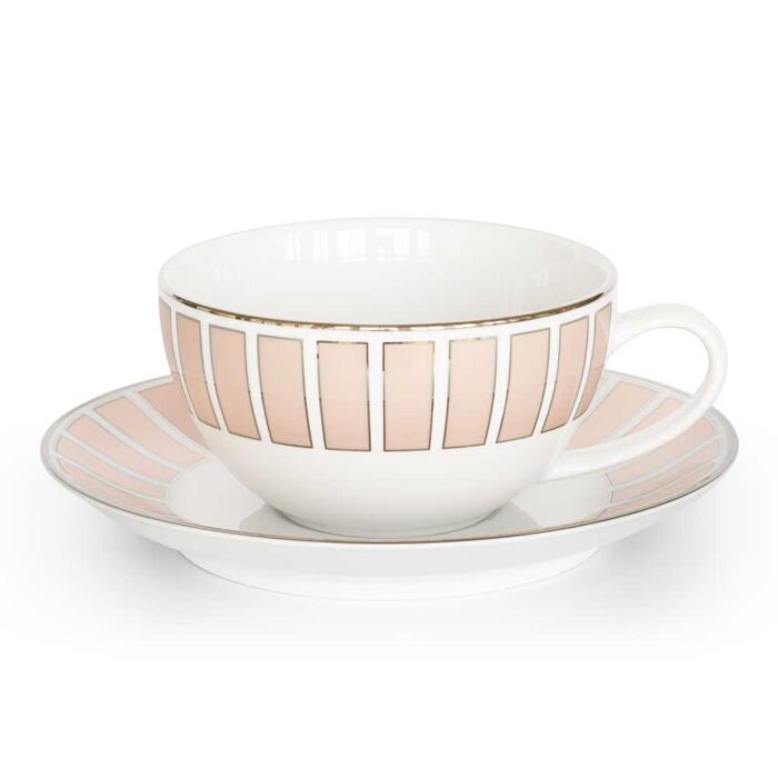 pink tea cup and saucer