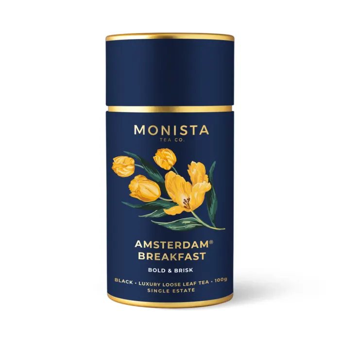 navy blue tea canister with yellow tulips on it