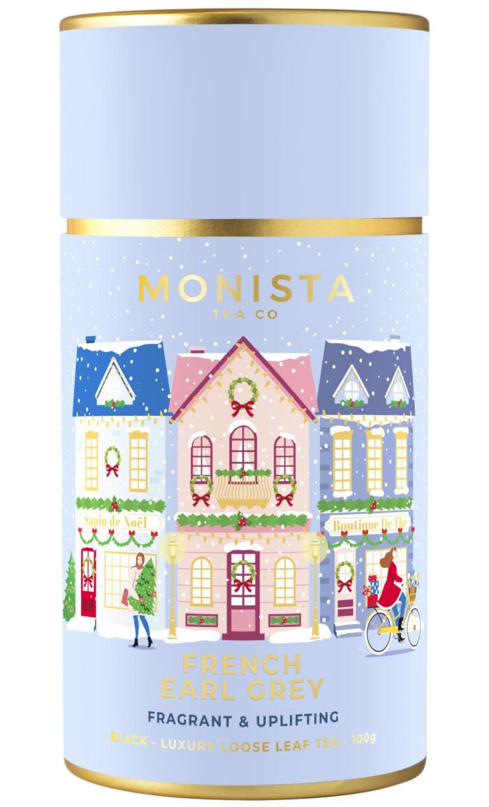 blue tea canister with cute houses