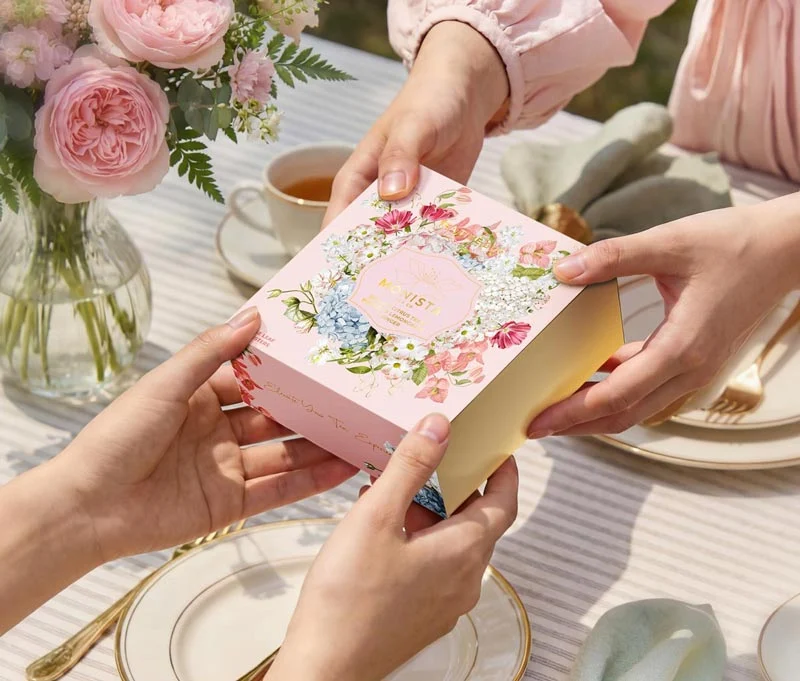 Mother’s Day Gifts hands gifting a pretty gift