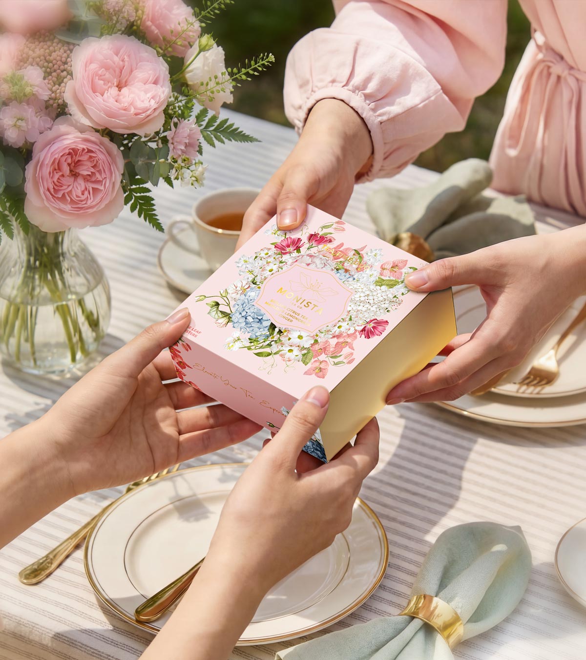 hands gifting a pretty gift