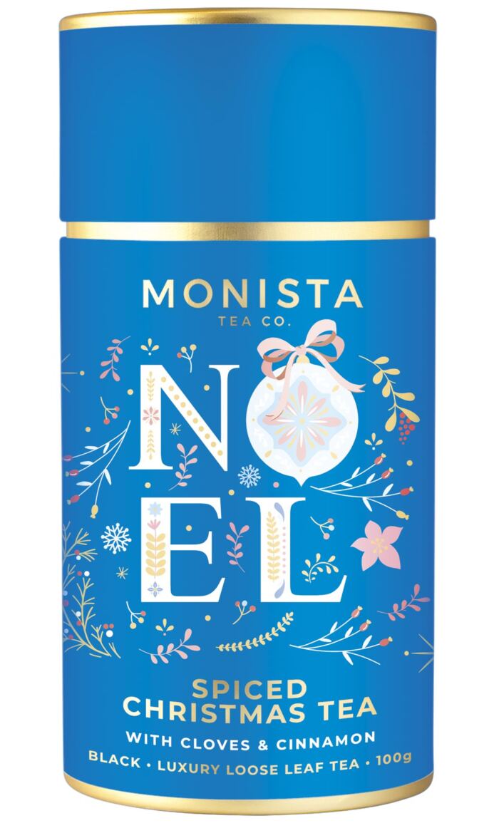 blue tea canister with the word Noel on it