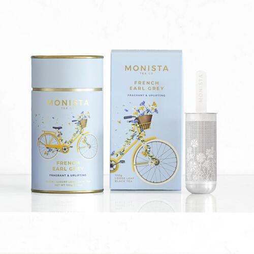 A tea canister and a refill box and infuser