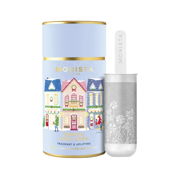 Pretty blue christmas tea canister with a silver stick infuser