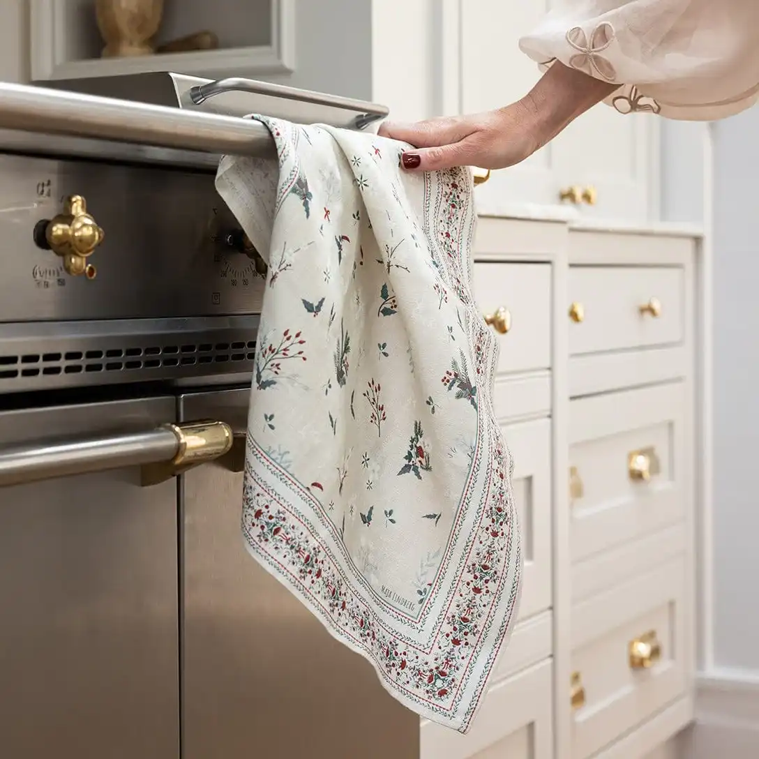 tea towel hanging on stove