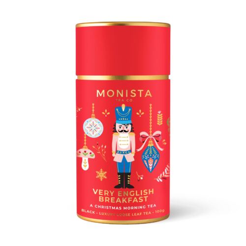 red christmas tea canister with nutcracker