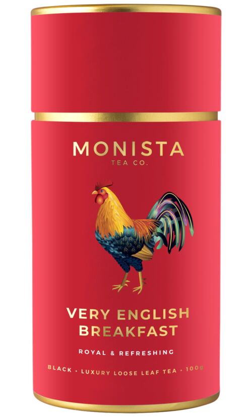 red tea canister with rooster on it