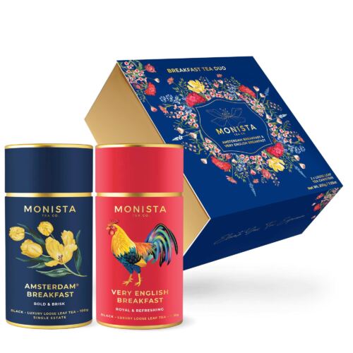 Two breakfast tea canisters in front of pretty gift box