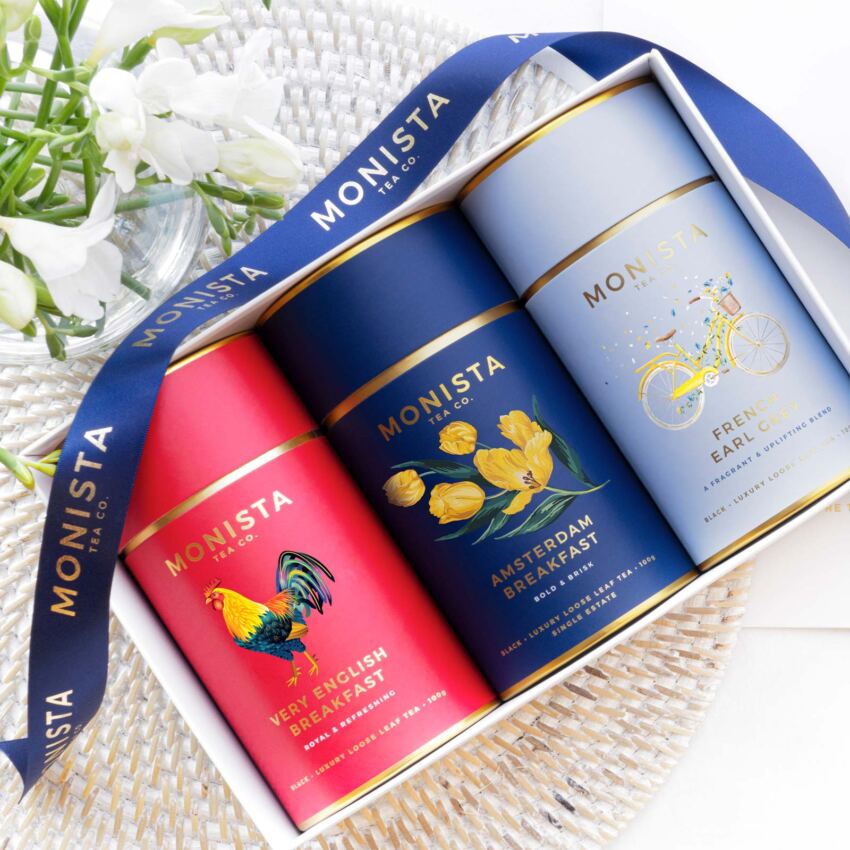 Gift box with tea canisters and ribbon