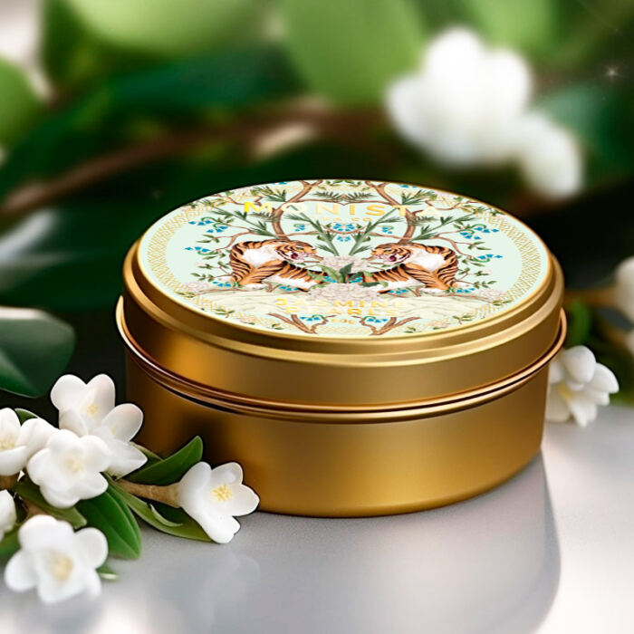gold tea tin surrounded by flowers