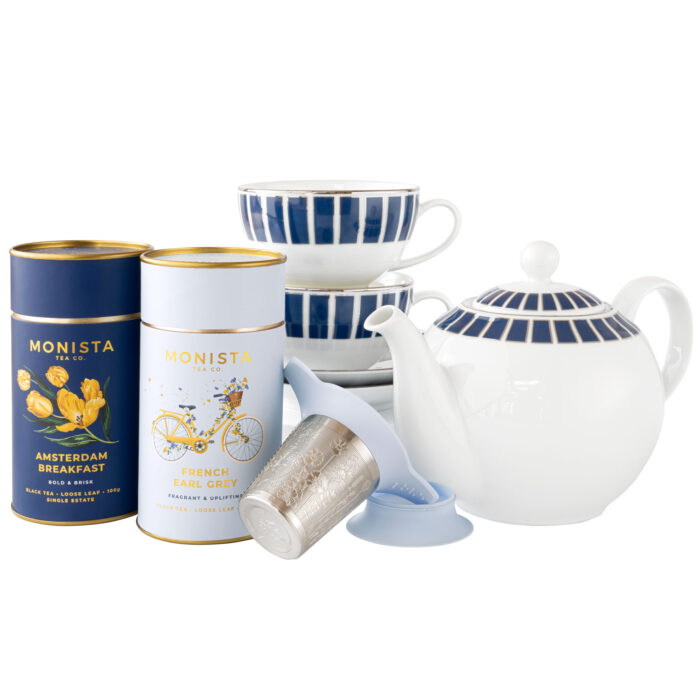 Tea pot tea cups and tea canisters