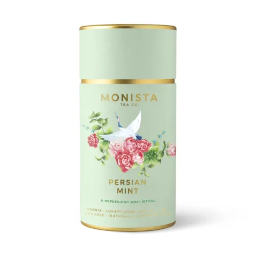 green tea canisters with storks and roses on it