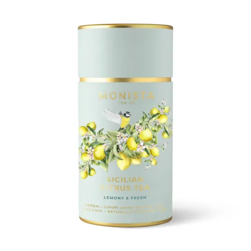 green tea canisters with lemons and a bird on it