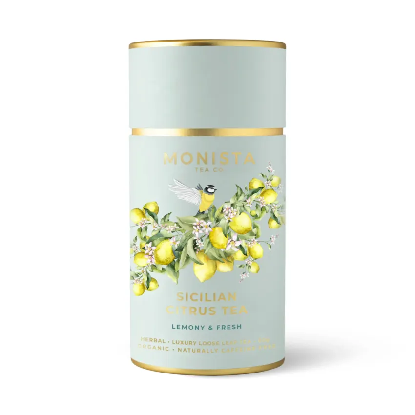 green tea canisters with lemons and a bird on it