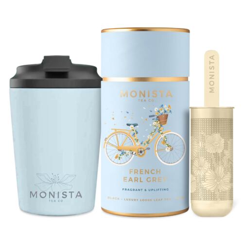 blue fressko cup with gold stick infuser and blue tea canister