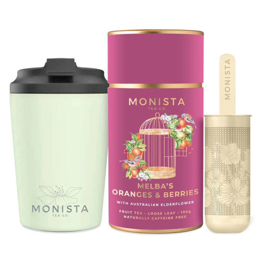 Green fressko cup with gold stick infuser and pretty tea canister