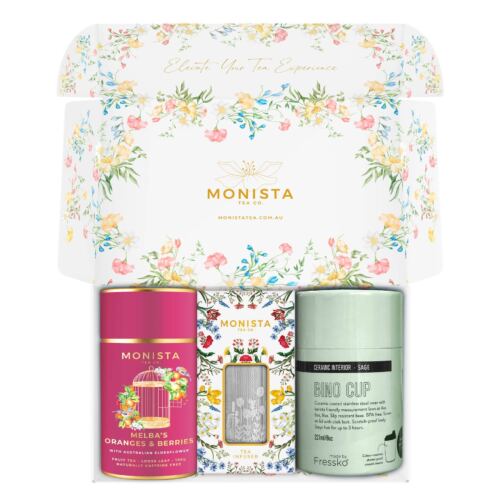 green fressko cup with silver stick infuser and maroon tea canister