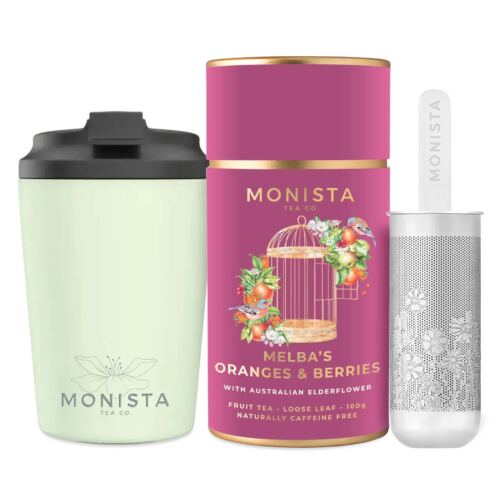 green fressko cup with silver stick infuser and maroon tea canister