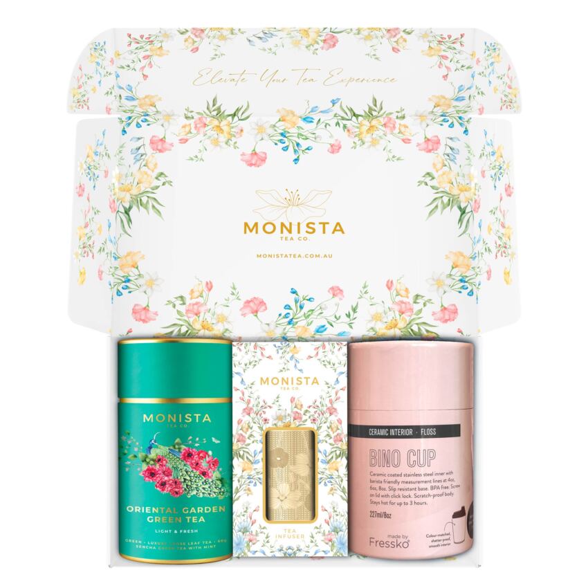 pink fressko cup with gold stick infuser and pretty tea canister