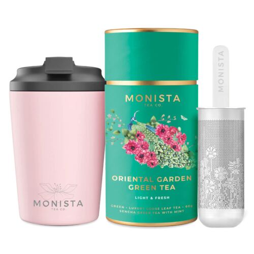 pink fressko cup with silver stick infuser and pretty tea canister