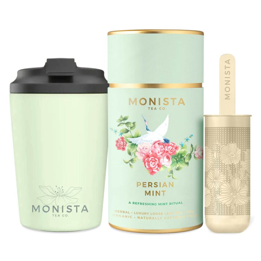 green fressko cup with gold stick infuser and green tea canister
