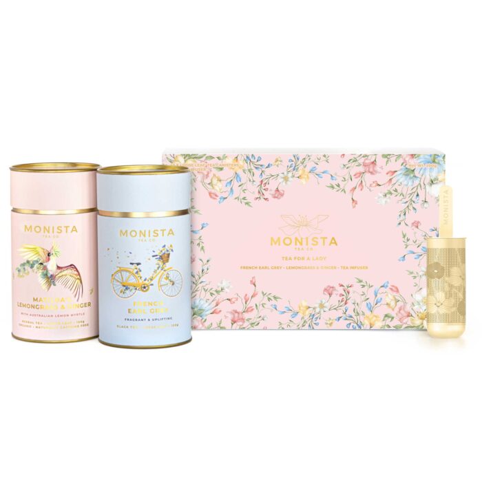 Pretty tea gift set with two tea canisters and gold infuser